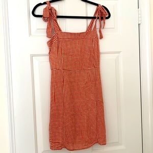 SAGE THE LABEL

Gingham mini dress with tie straps
So chic